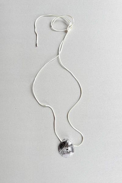THE SEER SILVER SHELL ECRU CORD NECKLACE